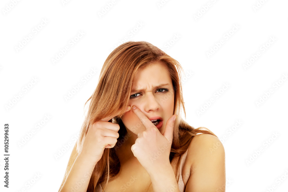 Teenage angry woman poping pimple Teenage angry woman poping pimple