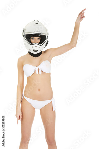 Woman in motorcycle helmet. © Piotr Marcinski