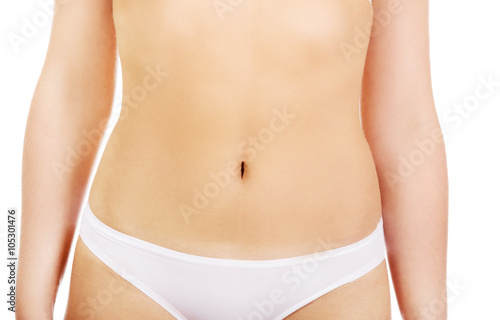 Body of slim young woman in white underwear