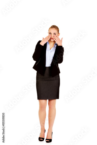 Young business woman with sinus pressure pain