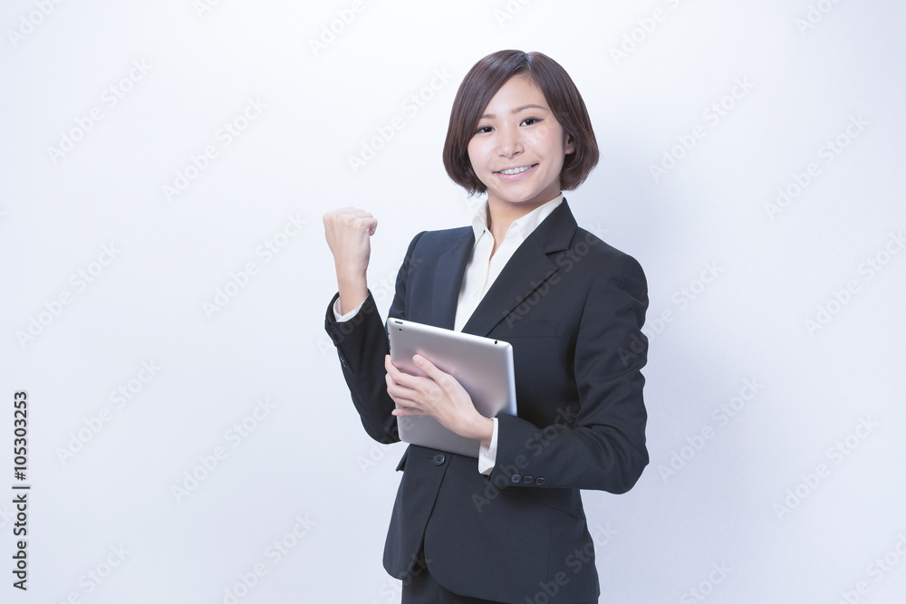 タブレット端末・喜ぶ女性 タブレット端末・喜ぶ女性