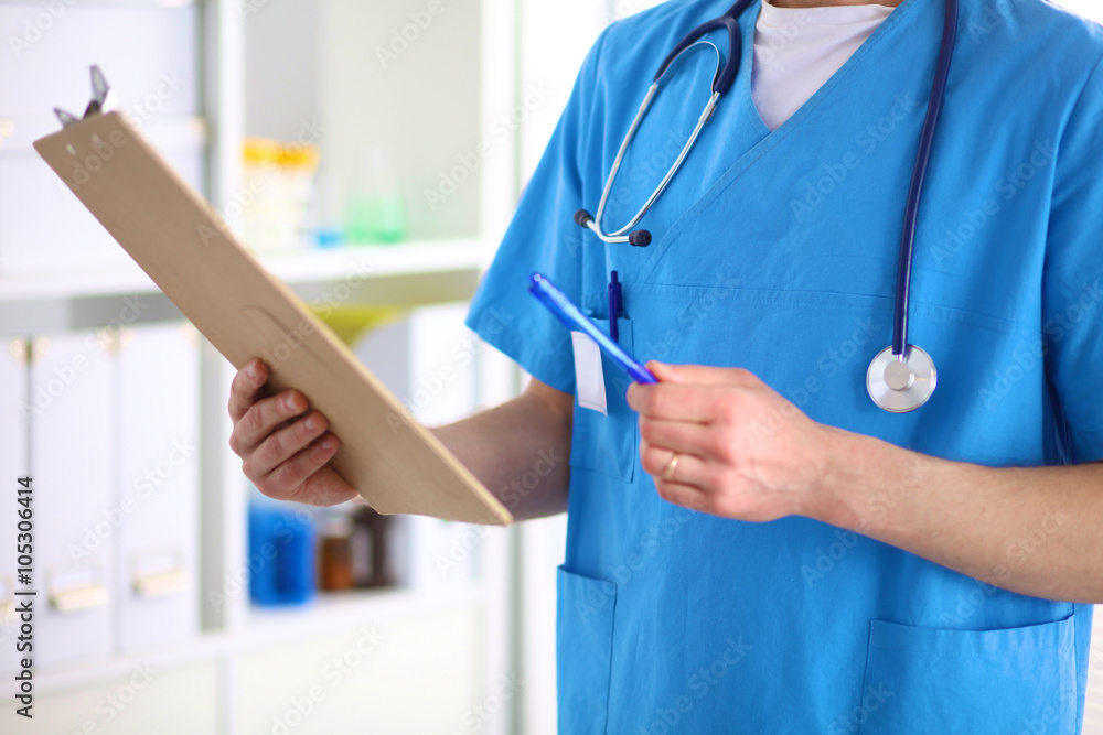 Closeup portrait of a doctor with stethoscope holding folder Closeup portrait of a doctor with stethoscope holding folder