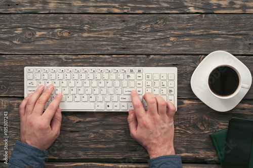 Businessman working on laptop for the office desktop photo