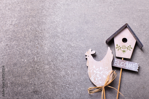 Symbols of spring and Easter - hen and bird house