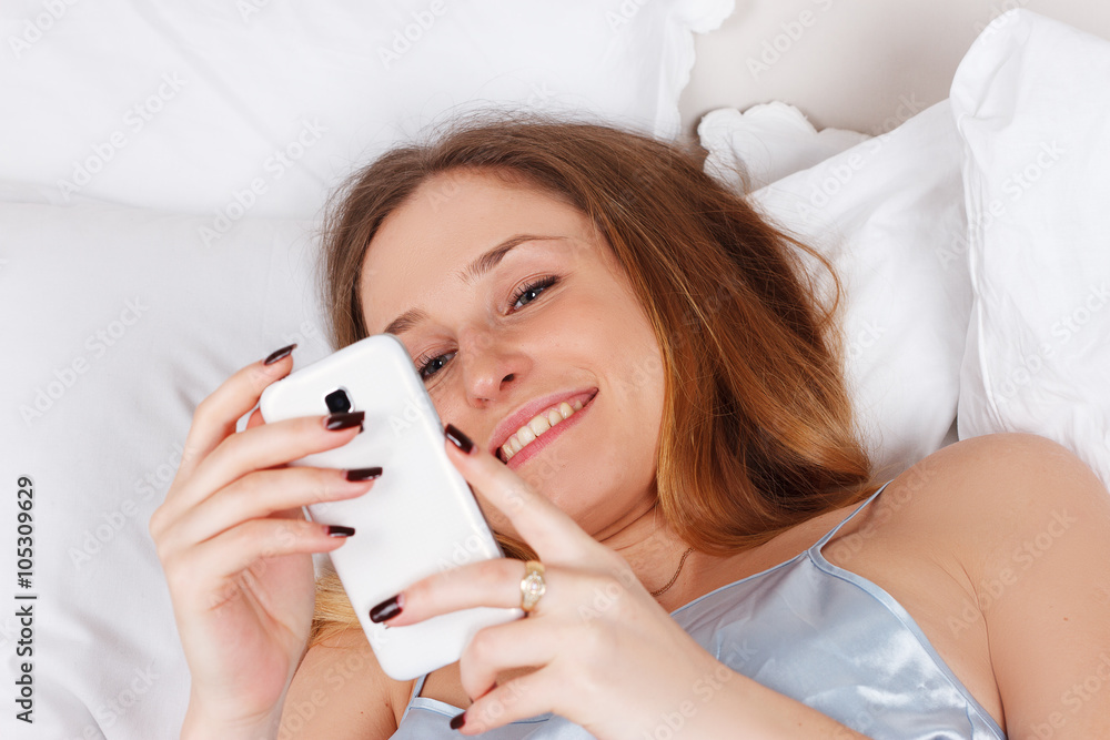 Portrait of a happy woman with mobile phone Portrait of a happy woman with mobile phone