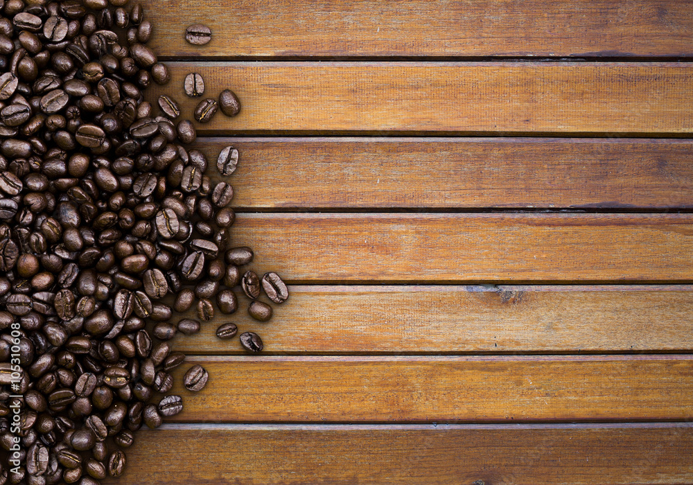 Coffee beans on wooden background Coffee beans on wooden background