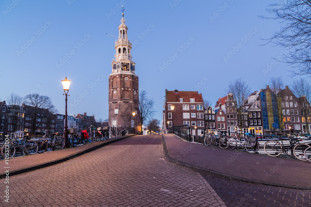 Obraz premium Oudeschans Canal and Montelbaanstoren Tower in Amsterdam