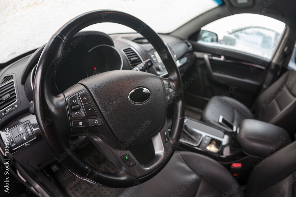 Driver seat and steering wheel are in car interior, wide angle view, nobody Driver seat and steering wheel are in car interior, wide angle view, nobody