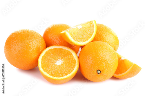 large and delicious sliced oranges laid out on a white isolated background