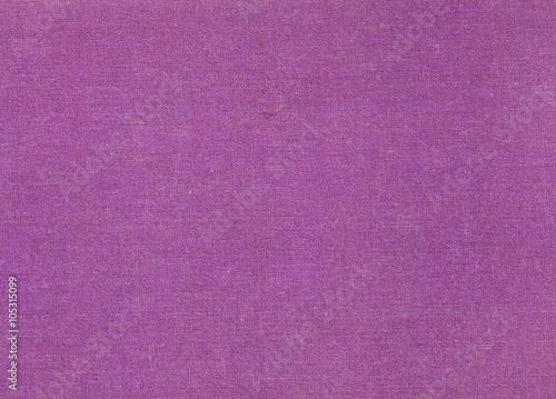 Old violet fabric book cover texture.