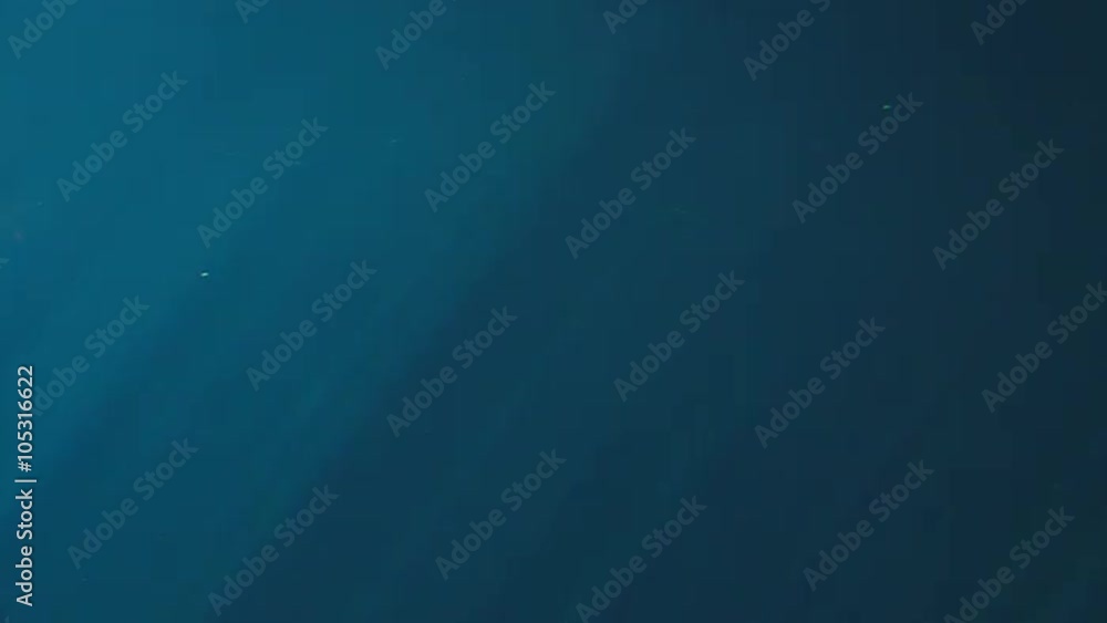 Underwater rays of light. Abstract background texture. Underwater rays of light. Abstract background texture.