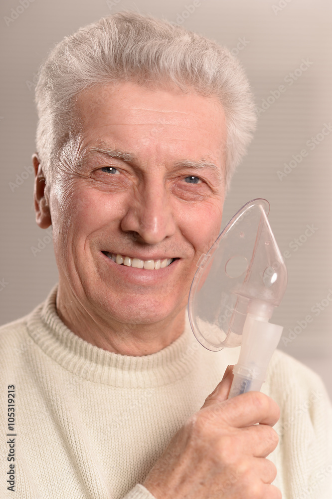 elderly man with flu inhalation elderly man with flu inhalation