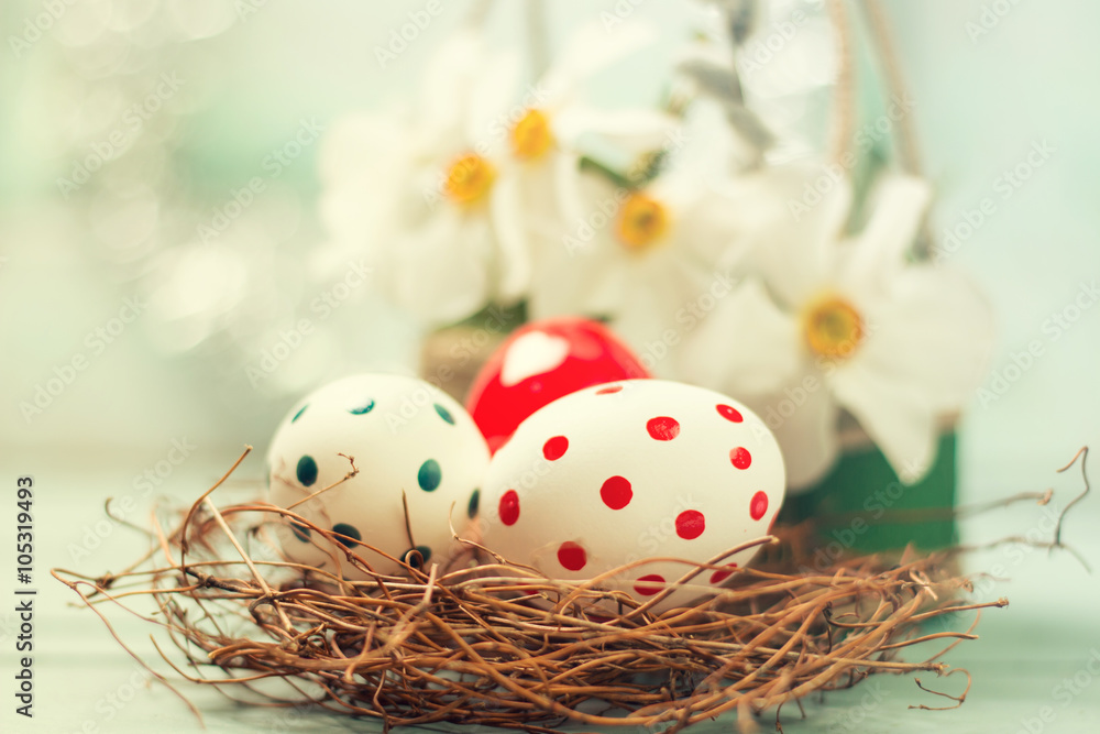 Obraz premium Easter concept with colored eggs on wooden background