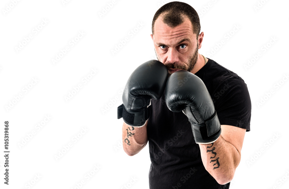 Portrait of male athlete boxer man looking aggressive with boxin Portrait of male athlete boxer man looking aggressive with boxin