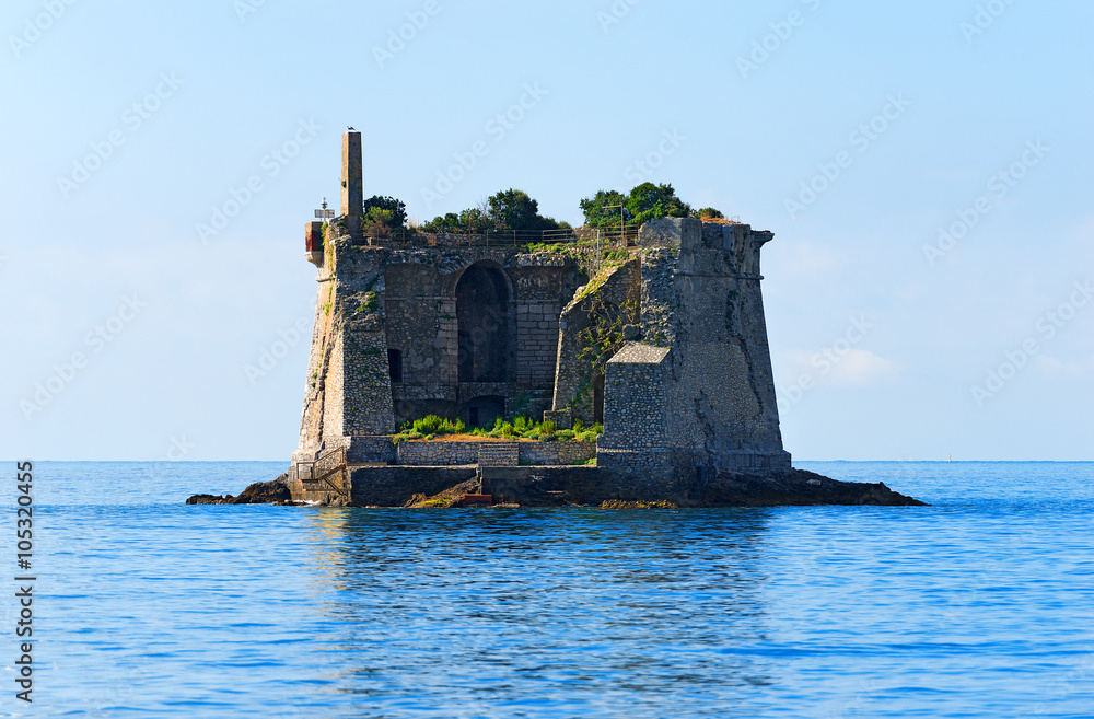 Scola Tower - Gulf of La Spezia Italy / The Scola Tower (Torre Scola) XVII century in the Gulf of La Spezia or Gulf of poets (Golfo dei poeti). La Spezia, Liguria, Italy