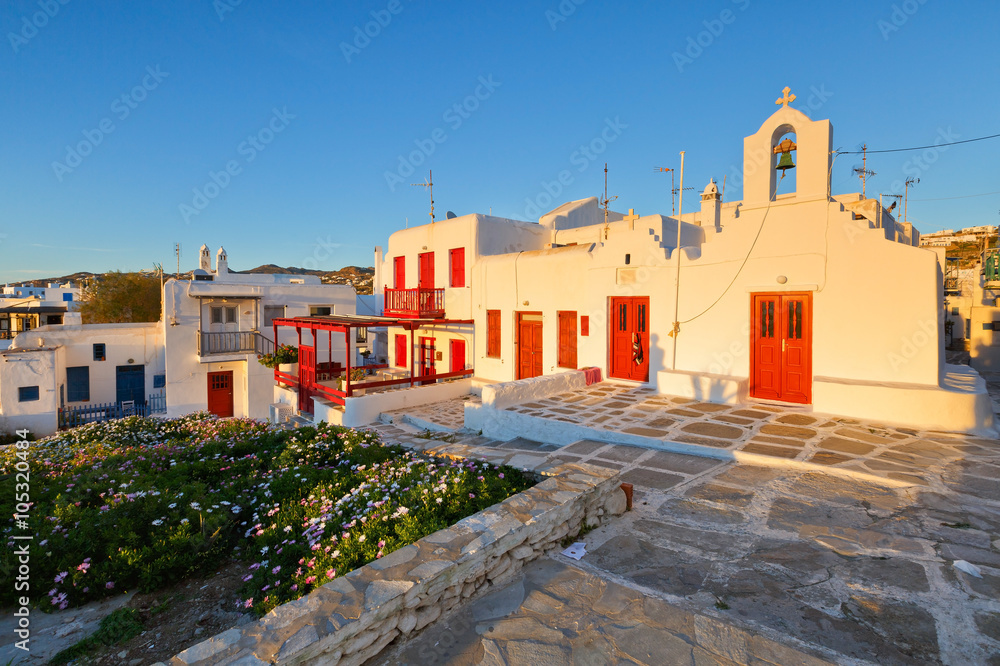 Church and traditional architecture in the town of Mykonos, Greece.