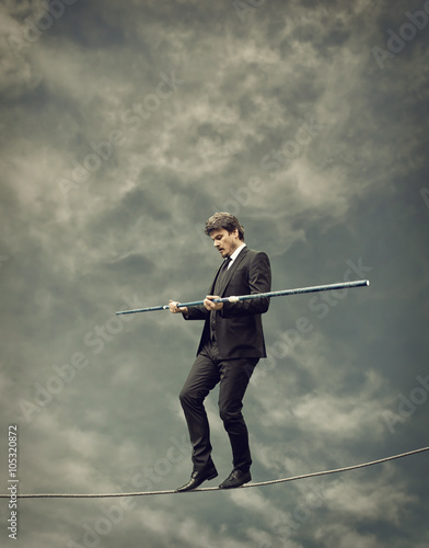 Εκτύπωση καμβά Businessman Walking on a Rope-Risky Business Concept