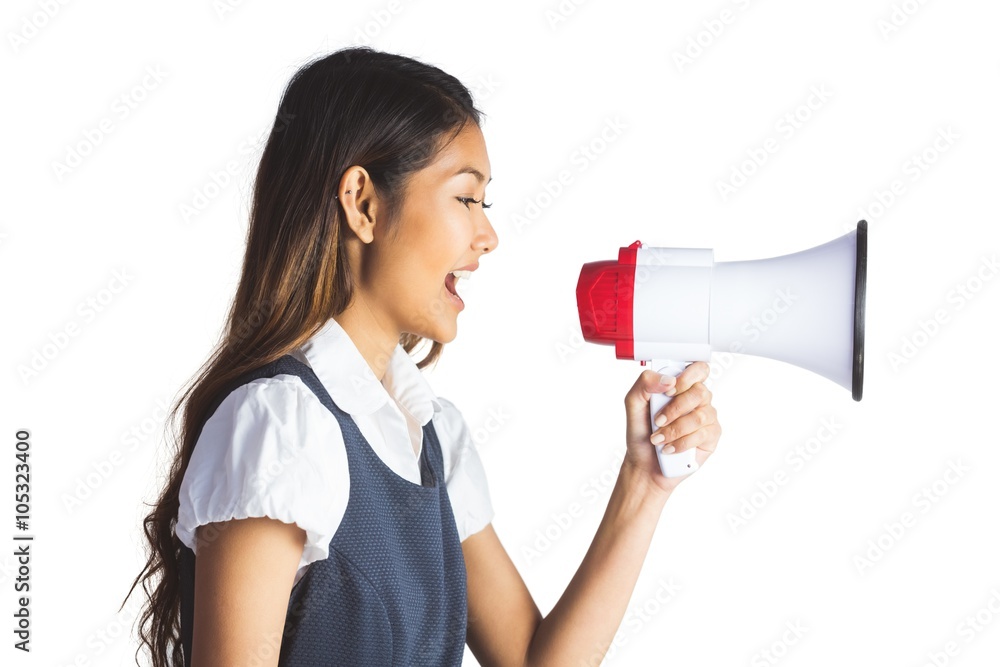 Businesswoman shooting through a megaphone Businesswoman shooting through a megaphone