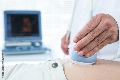 Pregnant woman undergoing ultrasound test