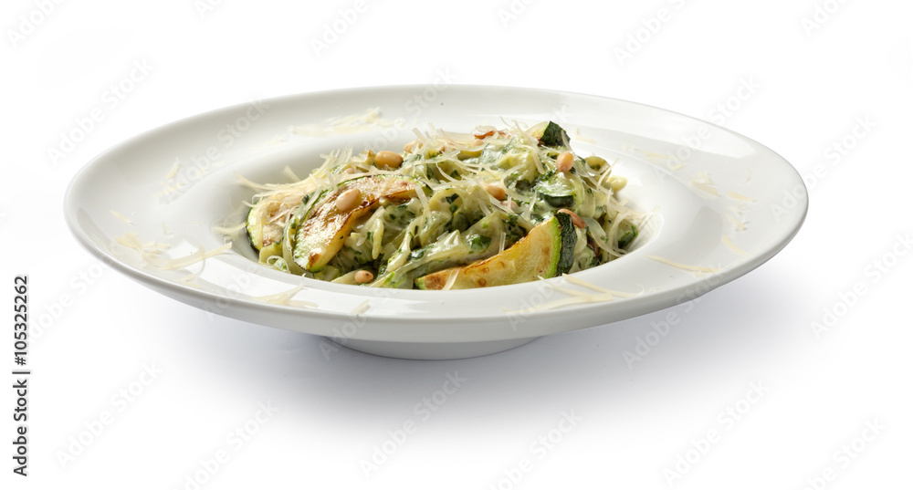 Pasta with spinach and zucchini. Front view. Pasta with spinach and zucchini. Front view.