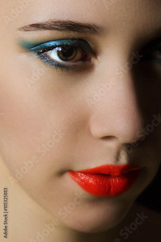 Close up beauty portrait of young woman with professional make u