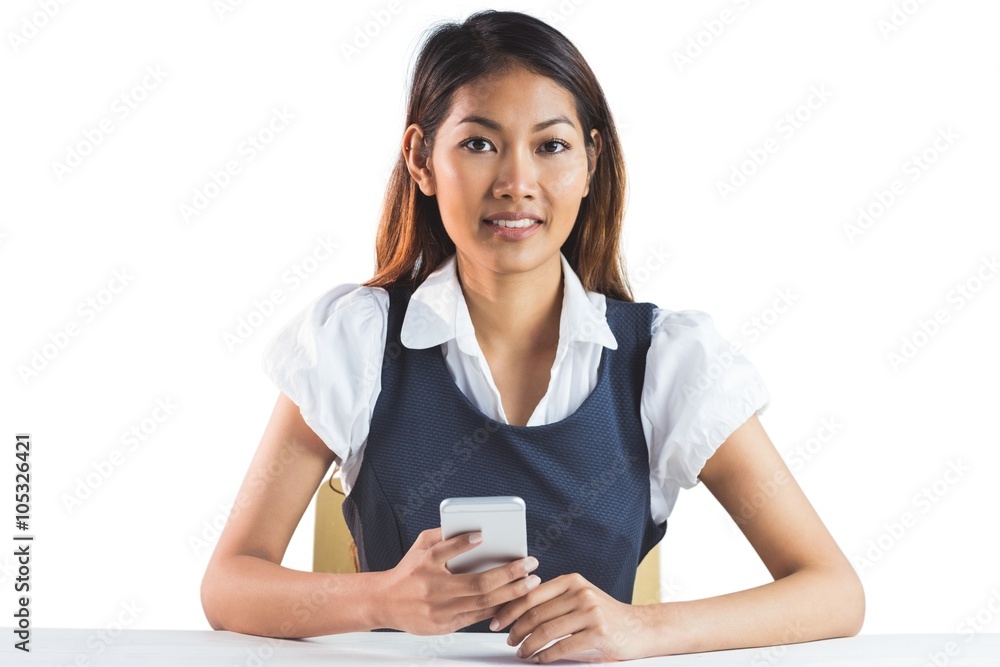 Businesswoman using her smartphone