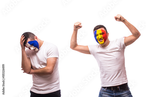 France vs Romania on white background. Football fan of Romania  and France national teams show  emotions: Romanian win, France lose.  European  football fans concept. photo