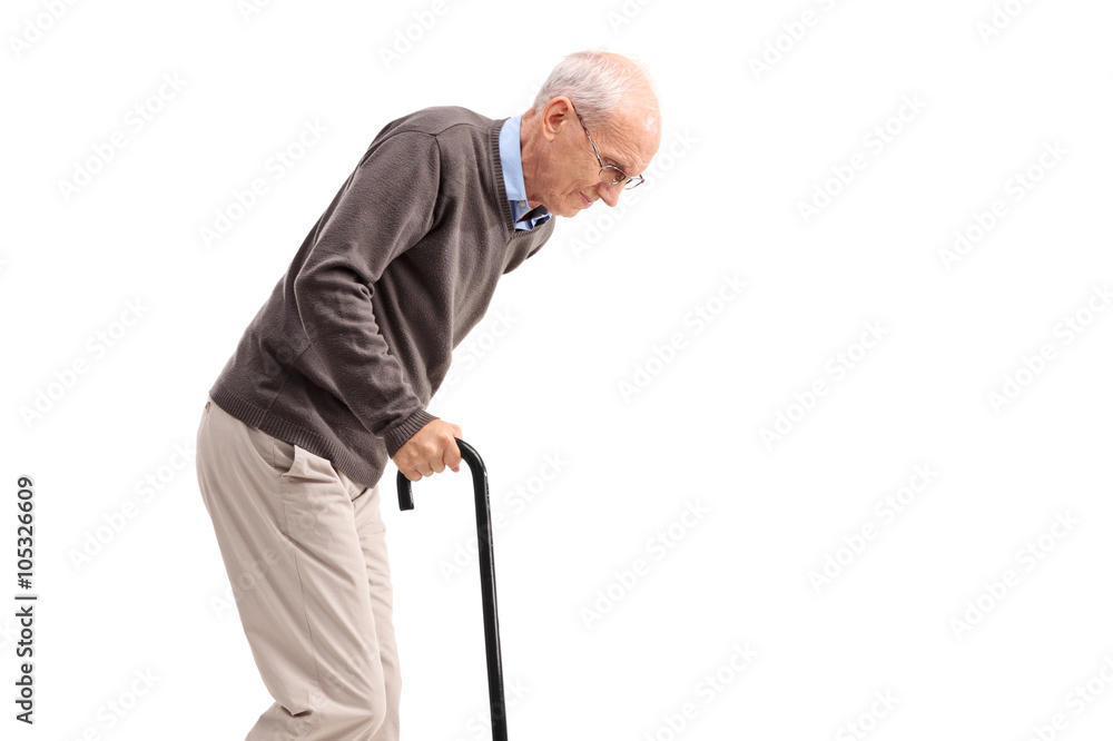 Exhausted old man walking with a cane Exhausted old man walking with a cane