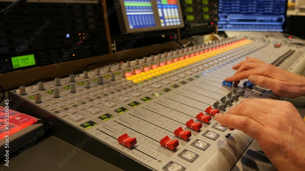 Controls of video and audio mixing console, close up of hands using it, 4K Controls of video and audio mixing console, close up of hands using it, 4K