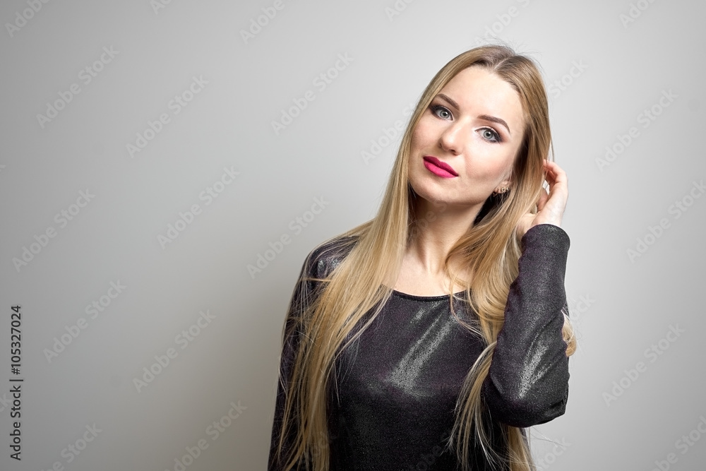 Fototapeta premium Fashion model with bright makeup. Portrait of young fashion woman with long blond hair