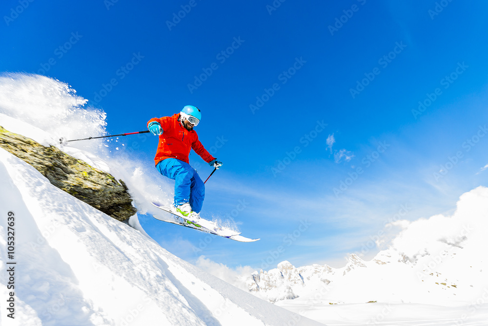 Skiing, Skier, Freeski, Freestyle, Freeride in fresh powder snow