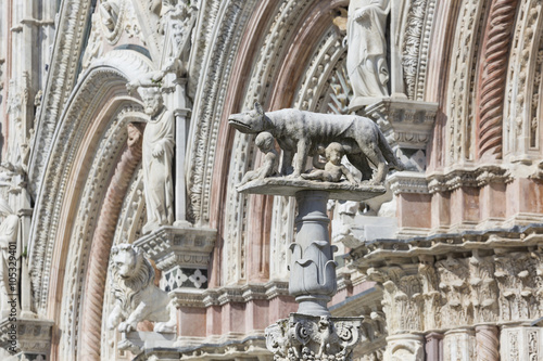 A she-wolf suckling the infants Romulus and Remus. Siena in Ital