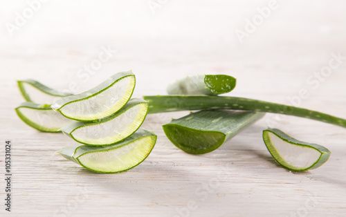 Aloe Vera leaves on wooden ...