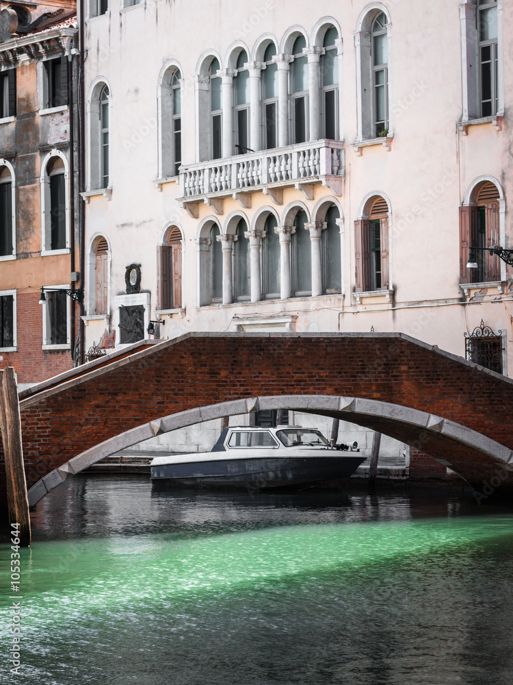 Bridge in Venice, Italy and Historical Building Facade in Backgr