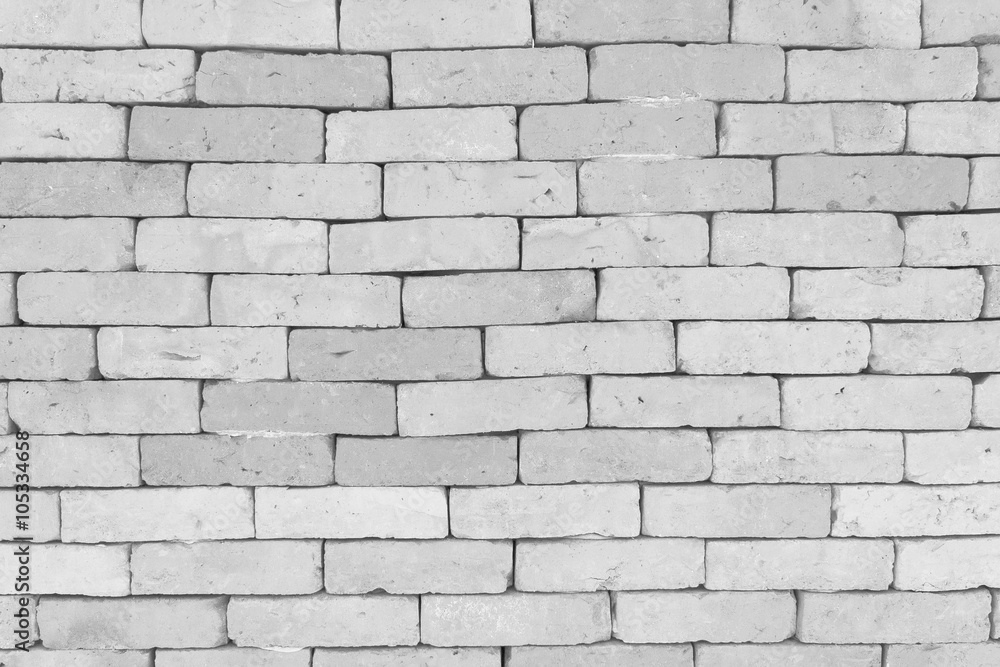 Design on gray brick wall for pattern and background Design on gray brick wall for pattern and background