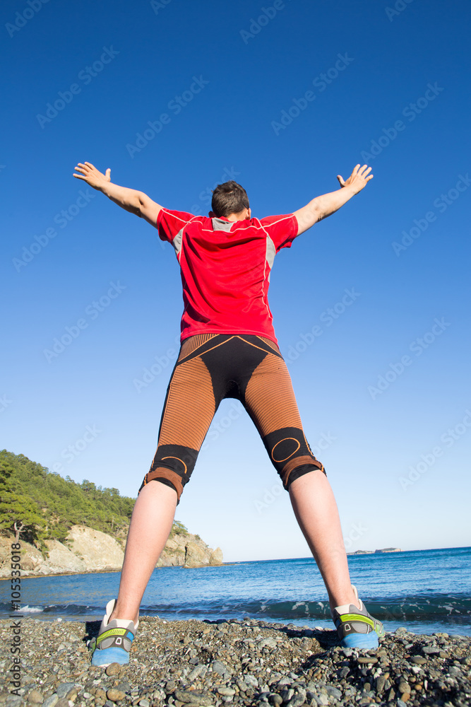 Trail runner training cardio running on rocky mountains yellow sand path in nature. Trail runner training cardio running on rocky mountains yellow sand path in nature.