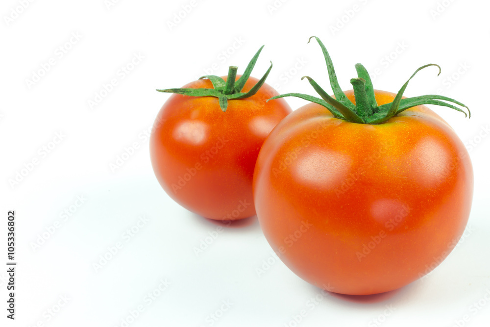 Tomatoes. Whole and a half isolated on white Tomatoes. Whole and a half isolated on white