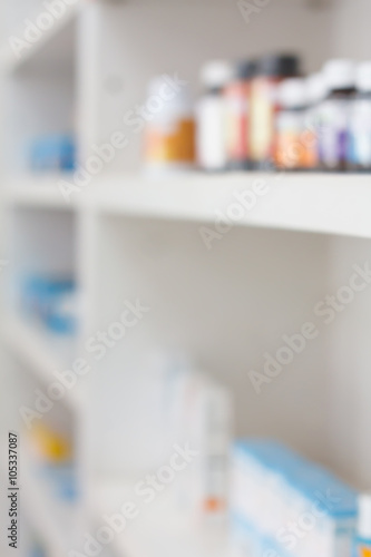 bottles on pharmacy store shelf