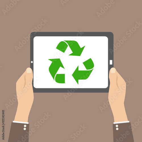 Recycle symbol in tablet, hands hold device