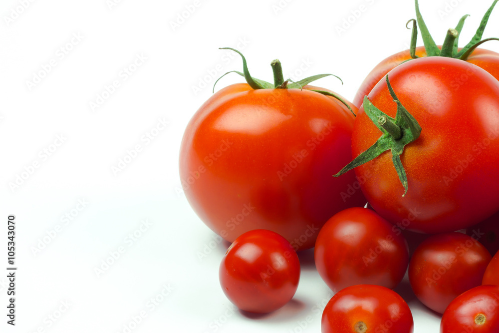 Tomatoes. Whole and a half isolated on white Tomatoes. Whole and a half isolated on white