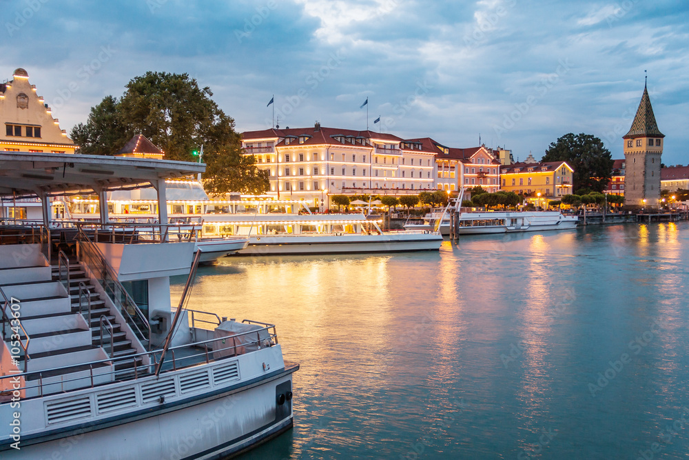 Fototapeta premium LINDAU, GERMANY - Lighthouse at port of Lindau harbour, Lake Constance, Bavaria