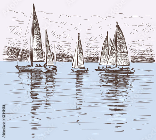 sailboats on a lake