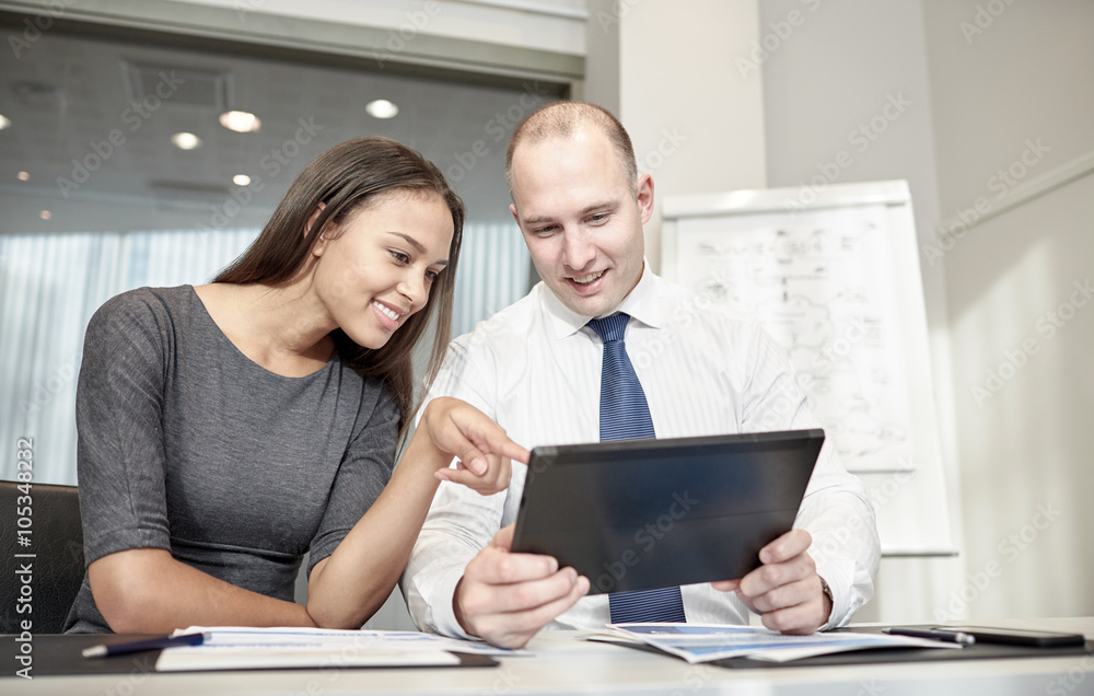 smiling businesspeople with tablet pc in office smiling businesspeople with tablet pc in office