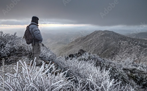 Man standing at cuyamaca peak, Cleveland National Forest, California, America, USA photo