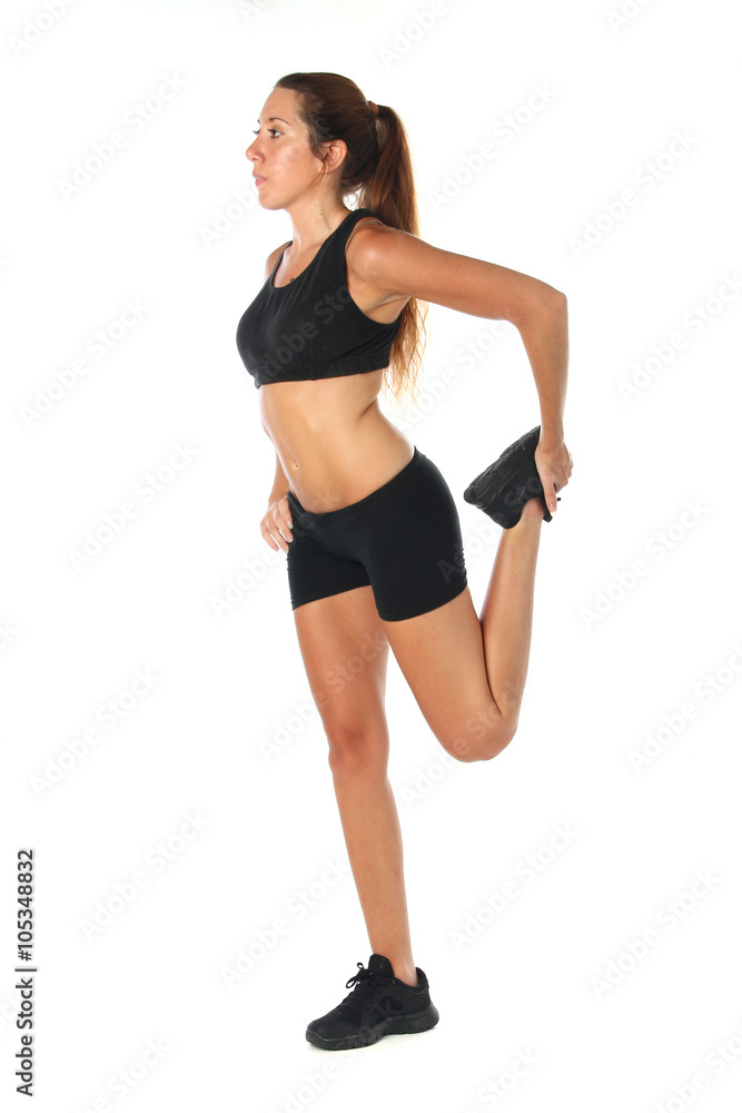 Happy young woman holding doing exercise and stretching over white Happy young woman holding doing exercise and stretching over white