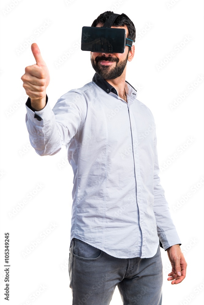 Man using VR glasses with thumb up Man using VR glasses with thumb up
