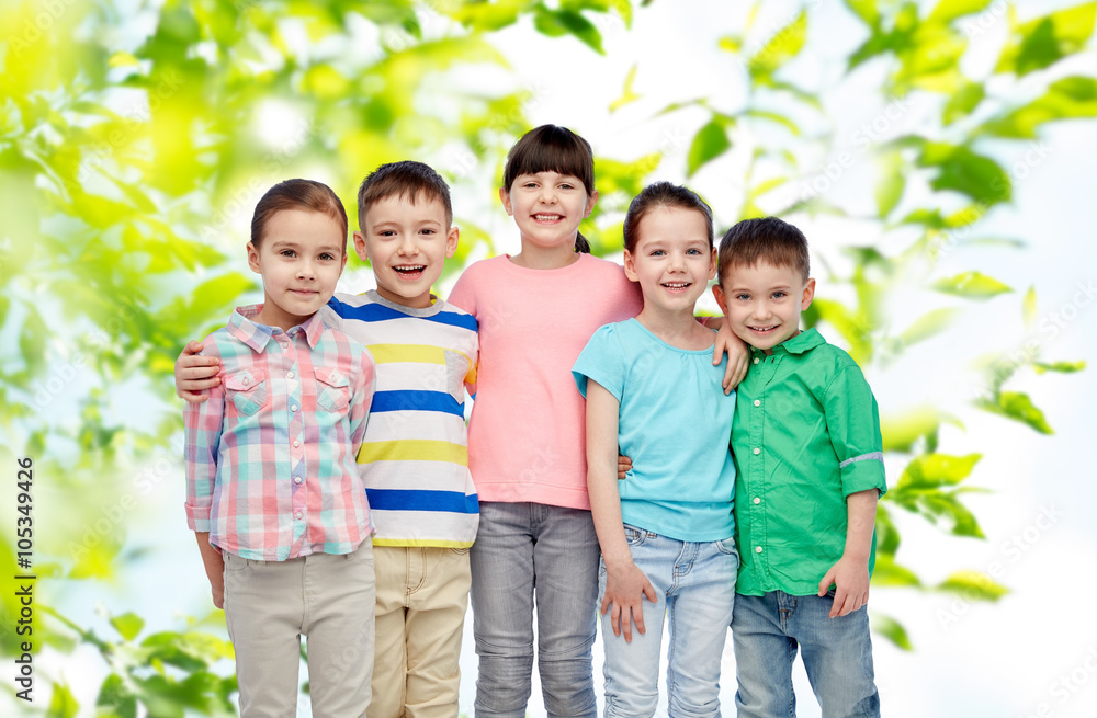 happy smiling little children hugging