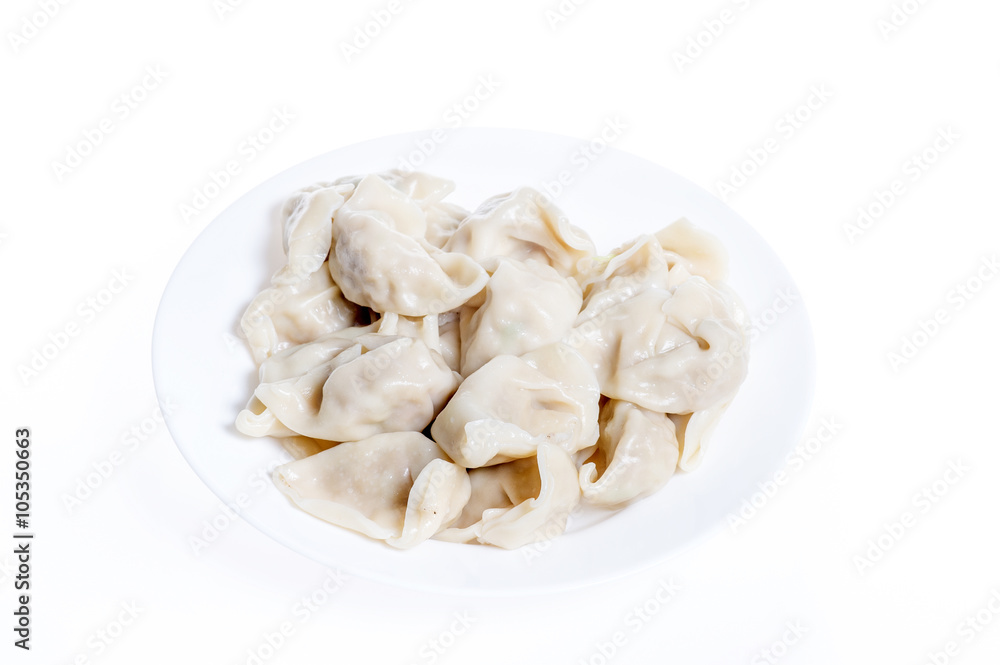 Dumplings in a plate isolated on white background Dumplings in a plate isolated on white background