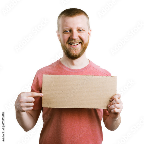 Funny man points by finger at the plate photo