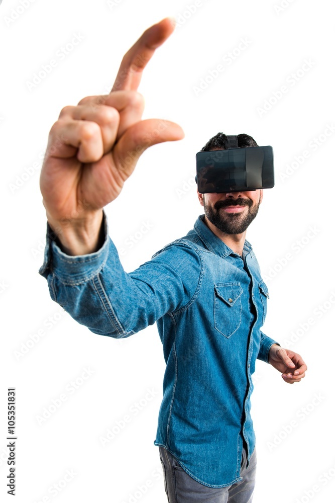 Man using VR glasses holding something Man using VR glasses holding something
